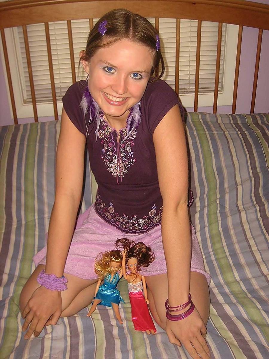 18P Silly teen getting nude and having fun with barbie