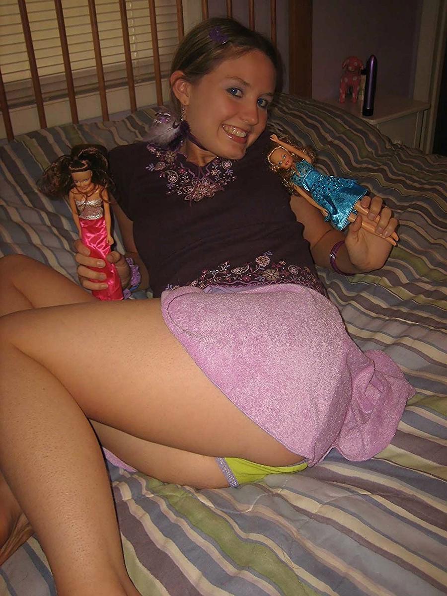 18P Silly teen getting nude and having fun with barbie