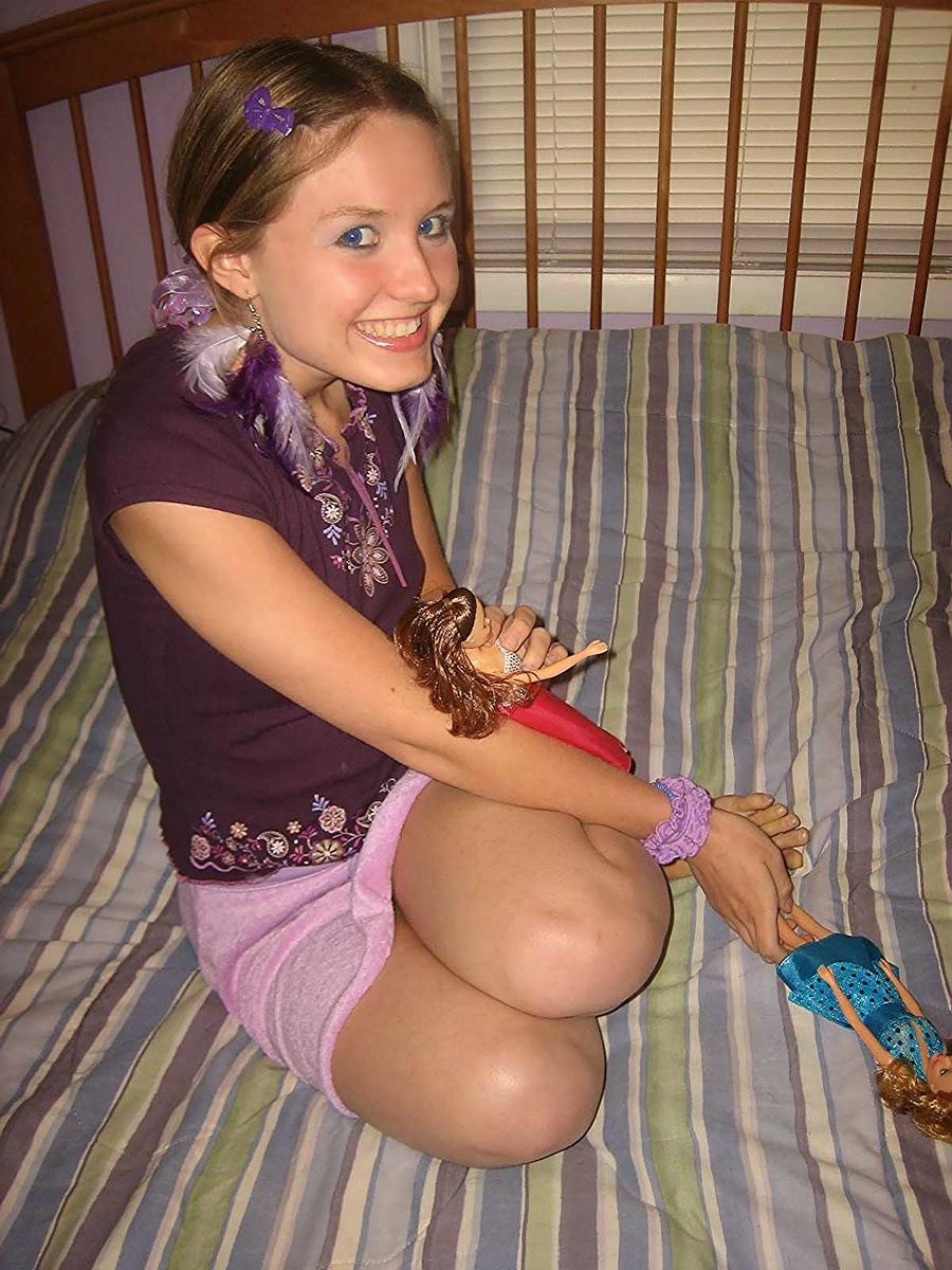 18P Silly teen getting nude and having fun with barbie