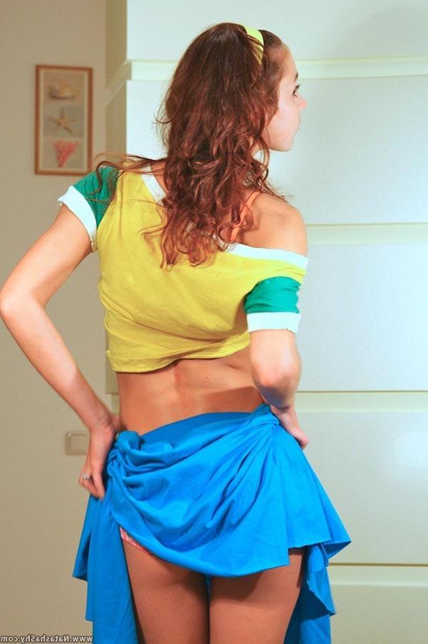 17P Lovely redhead teen stripping in front of the camera