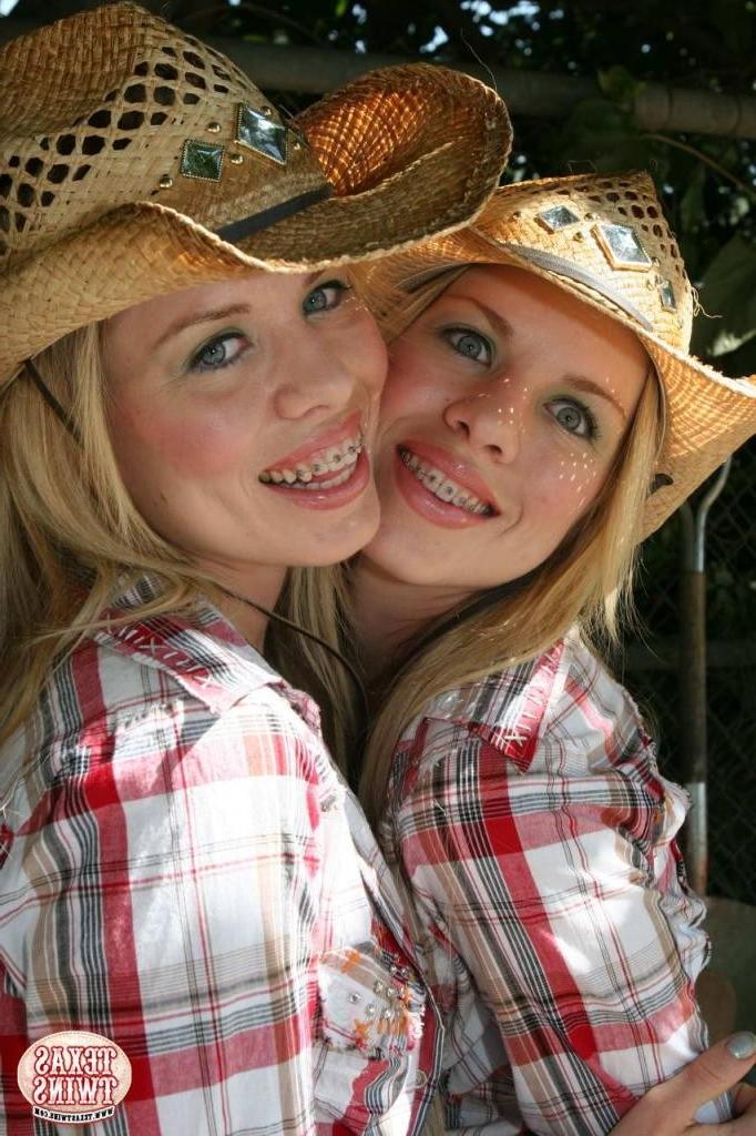 16P Two adorable hot twin teen sisters strip outdoors