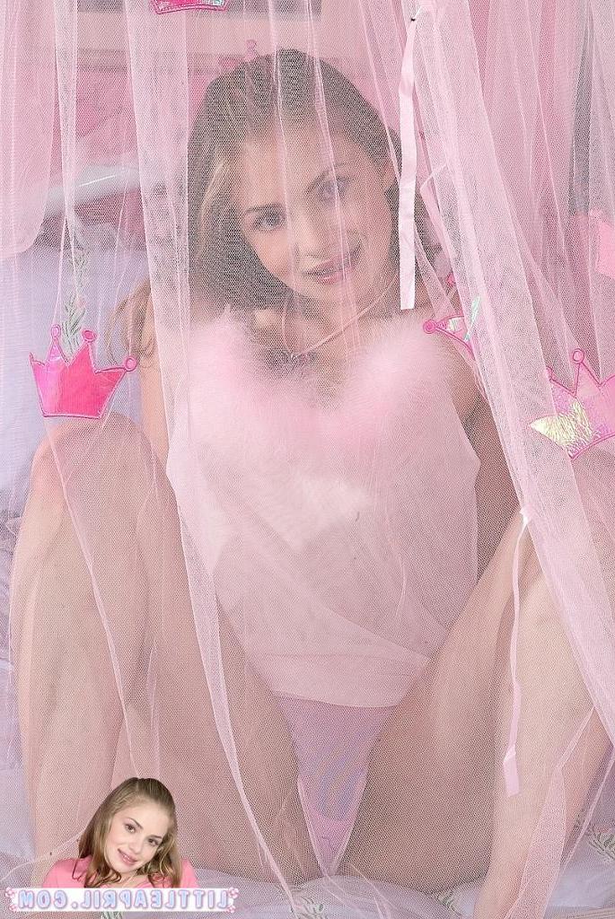16P An adorable teenie in pink spreading her pussy