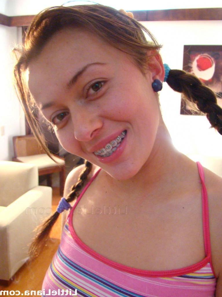 16P Two adorable teeange girls are kissing and touchin
