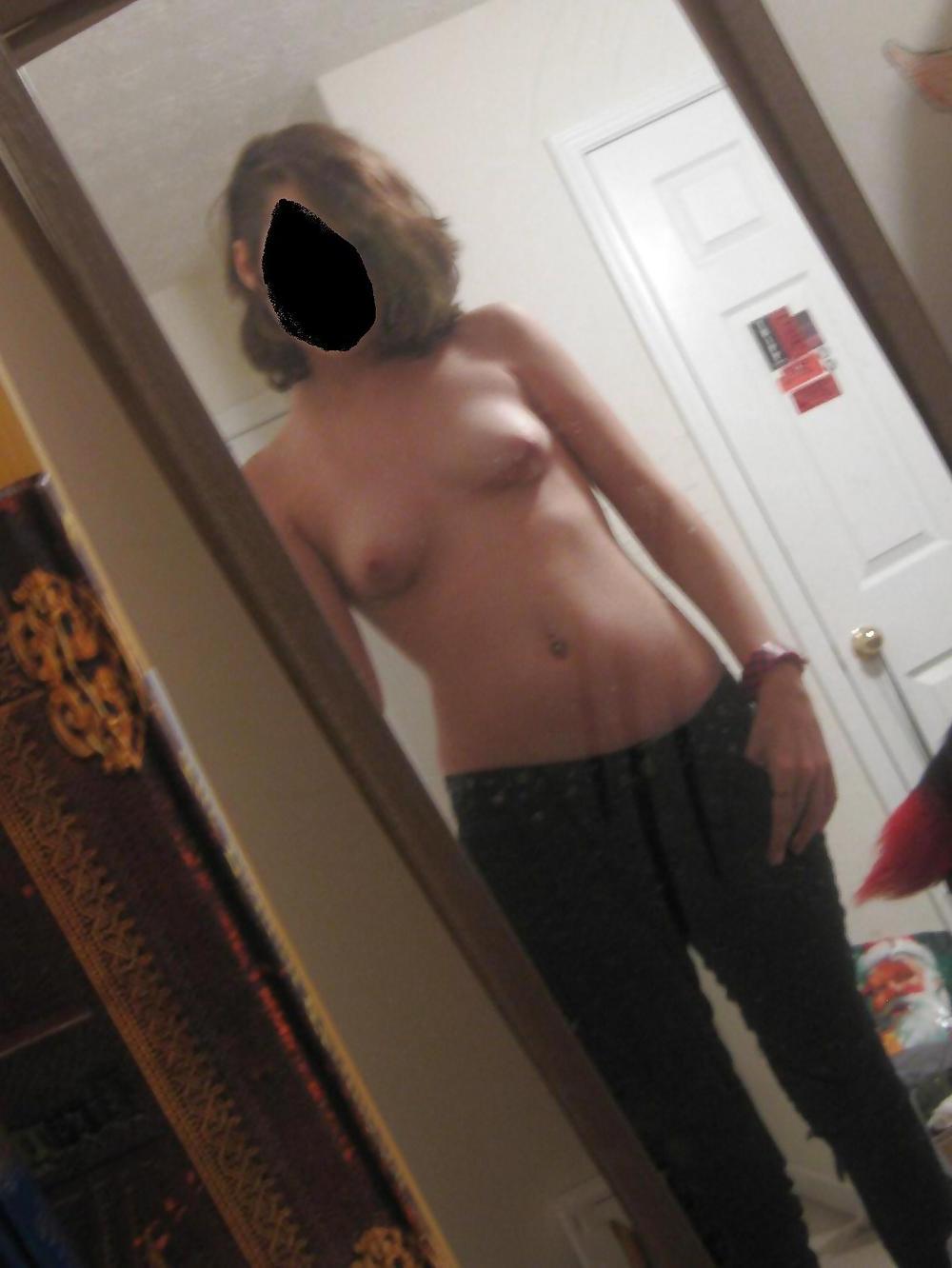 25P Young petite teen shows it all