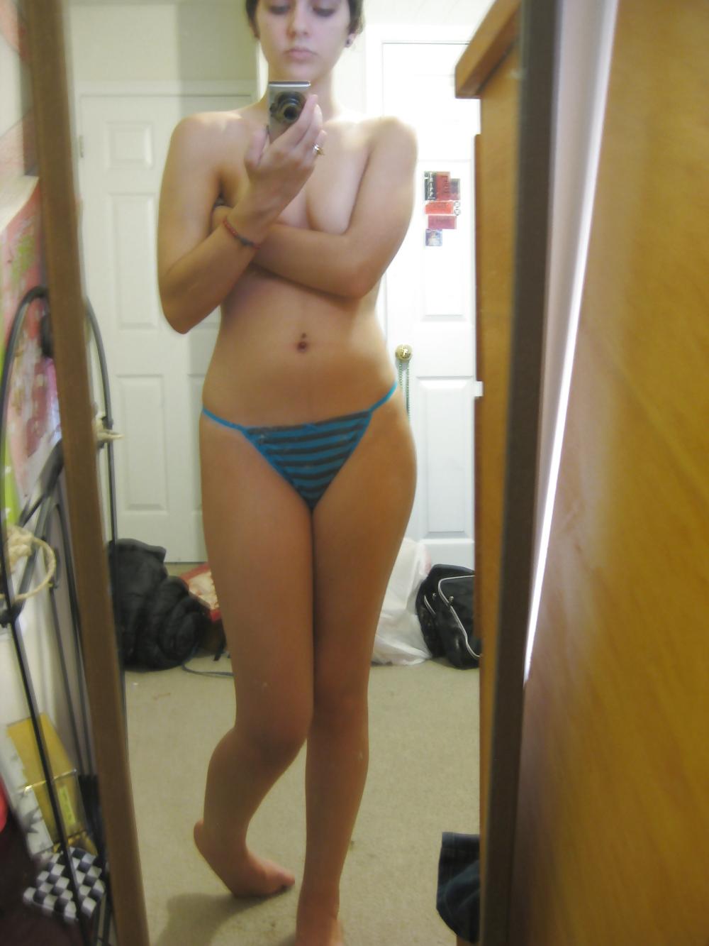 25P Young petite teen shows it all