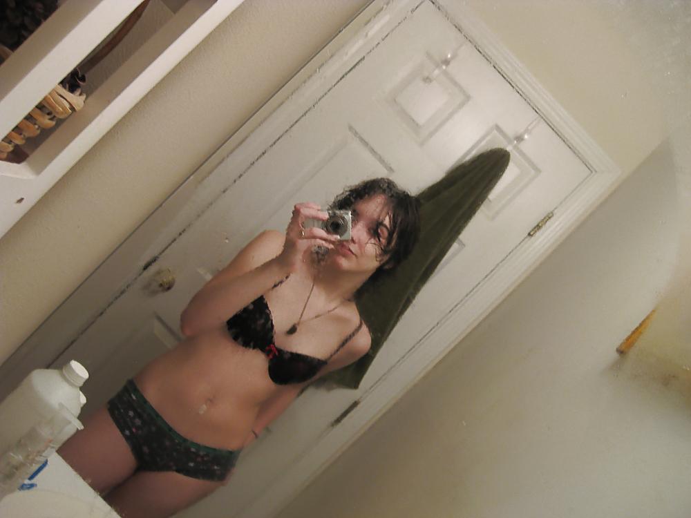 25P Young petite teen shows it all