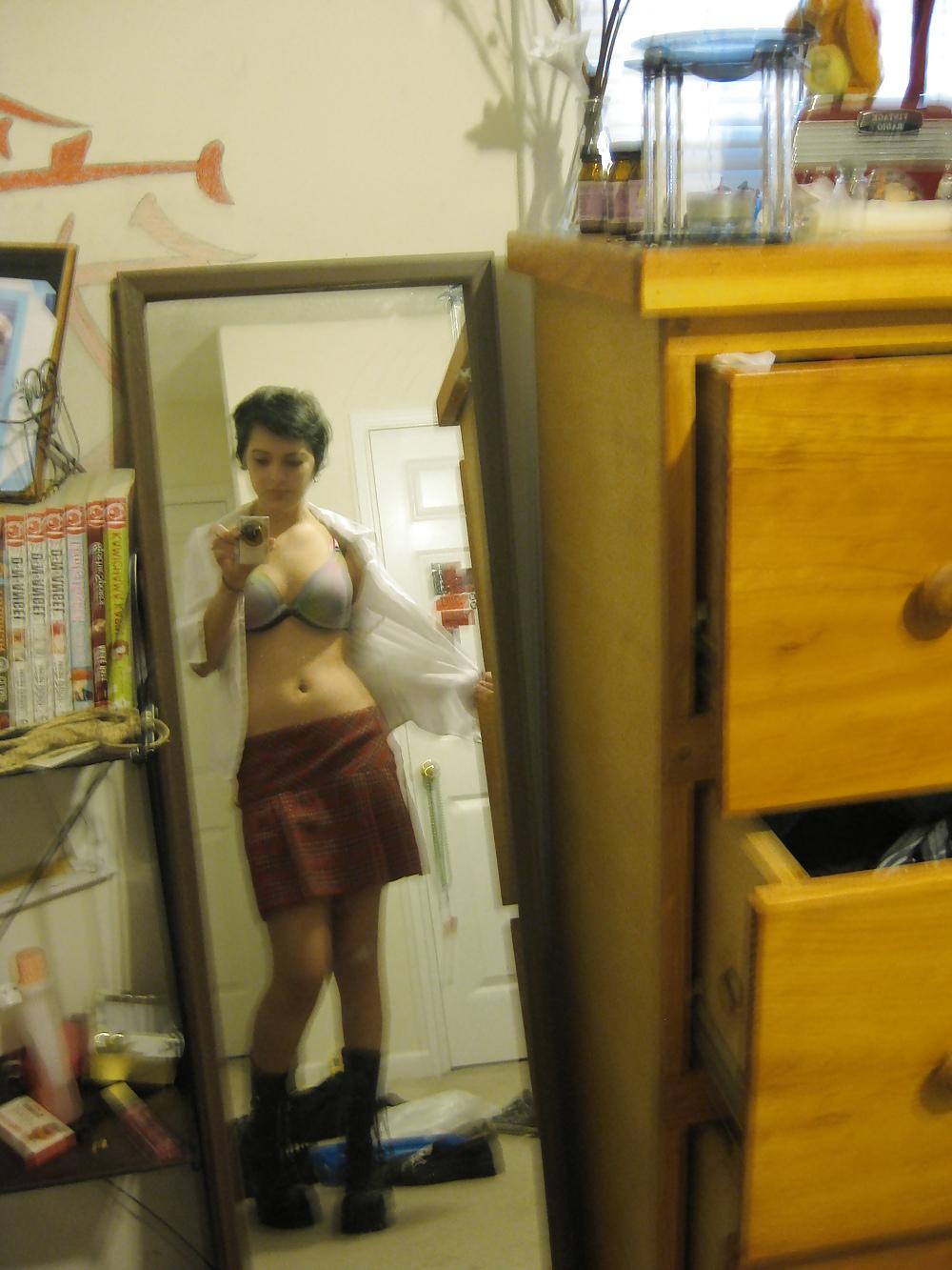 25P Young petite teen shows it all