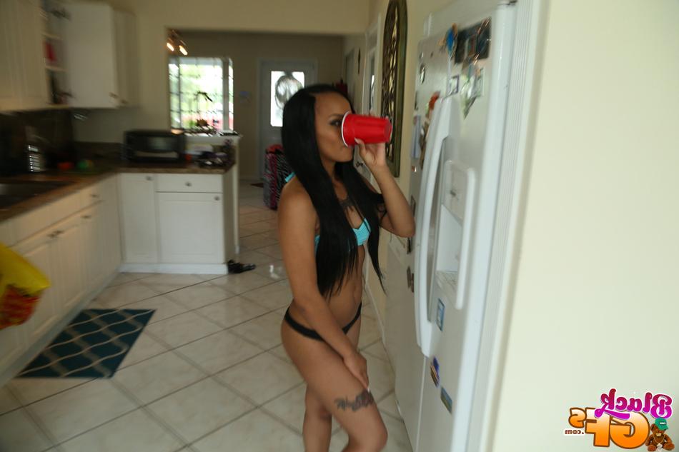 16P Amateur African model Payton Banks prancing around kitchen in thong panties