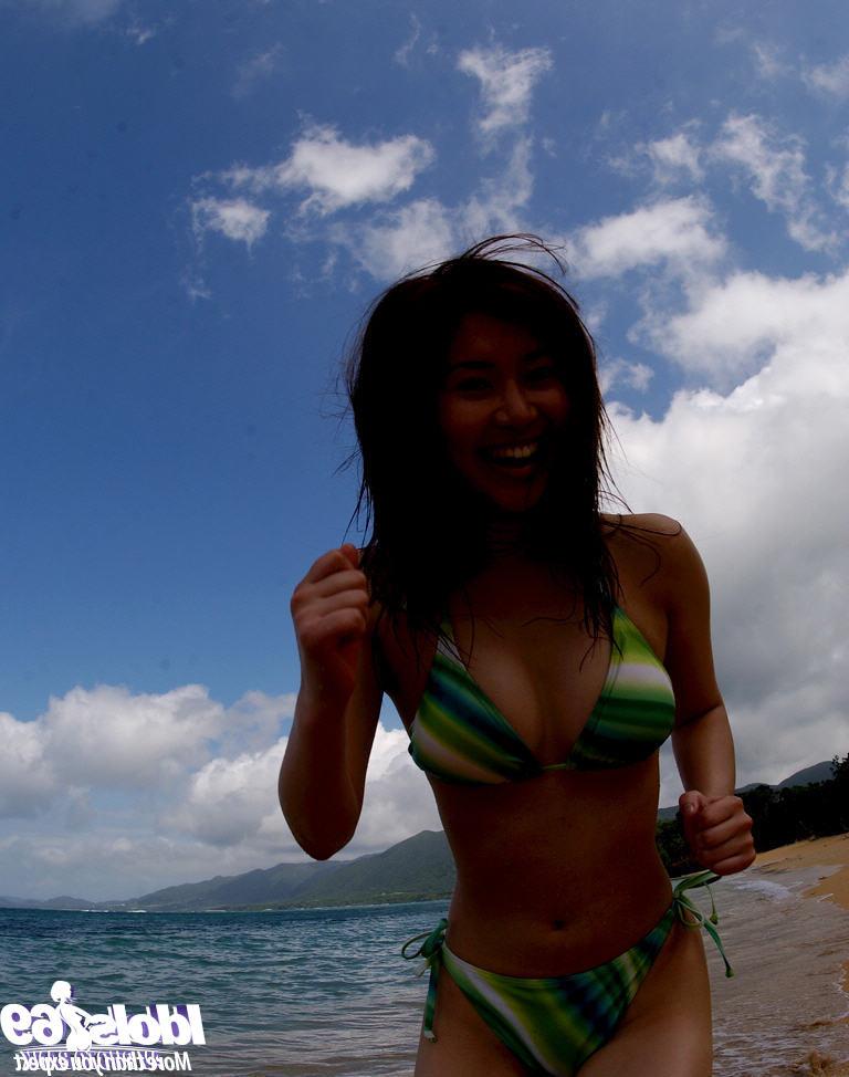 16P Busty asian babe Adusa Kyono slipping off her bikini outdoor