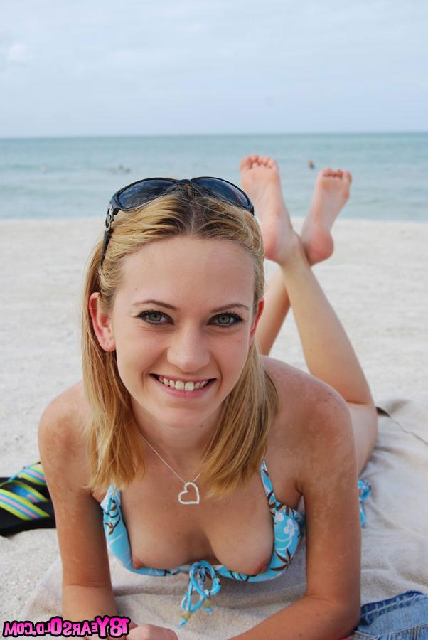 16P Teen babe Michelle drops her bikini bra to show her tits outdoor