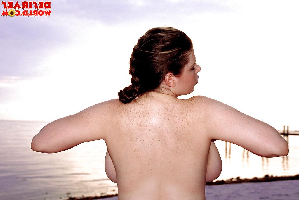16P Plump pornstar Desirae demonstrating massive saggy boobs outdoors on beach