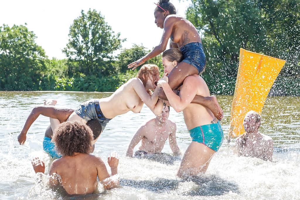 16P Amateur European boys and girls wrestle naked outdoors at the beach