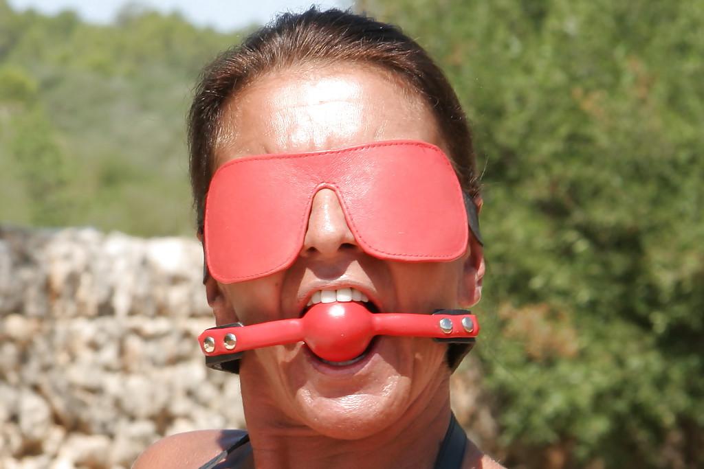 16P Blindfolded mature woman Lady Sarah playing with exposed nipples outdoors