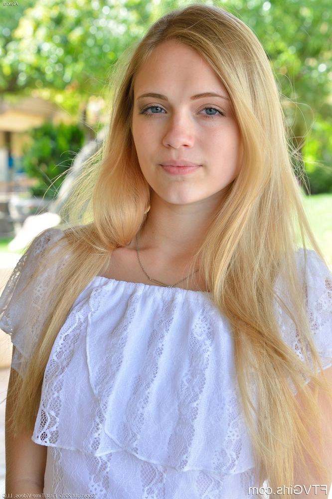 16P Horny blonde teen gives naked upskirt showing bald pussy outdoors