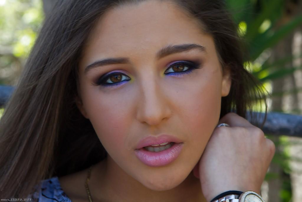 15P Beautiful teen babe Abella Danger strutting in yoga pants outdoors