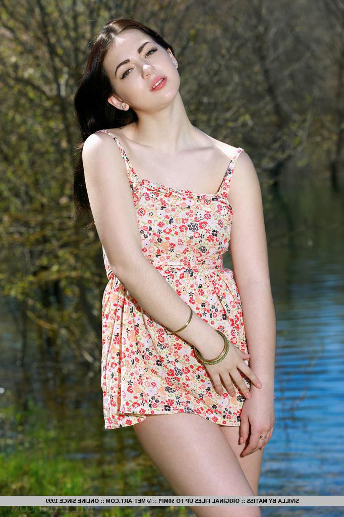 18P Brunette babe shedding summer dress outdoors for teen glamour photos