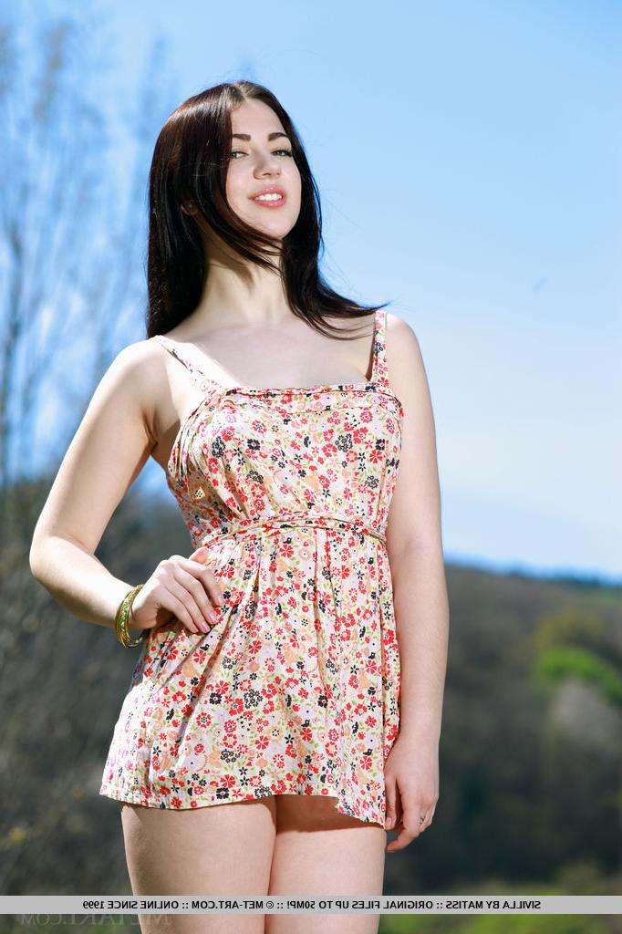 18P Brunette babe shedding summer dress outdoors for teen glamour photos