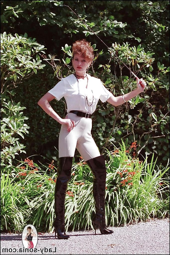 15P Tempting fetish lady posing in sexy horse jokey outfit outdoor