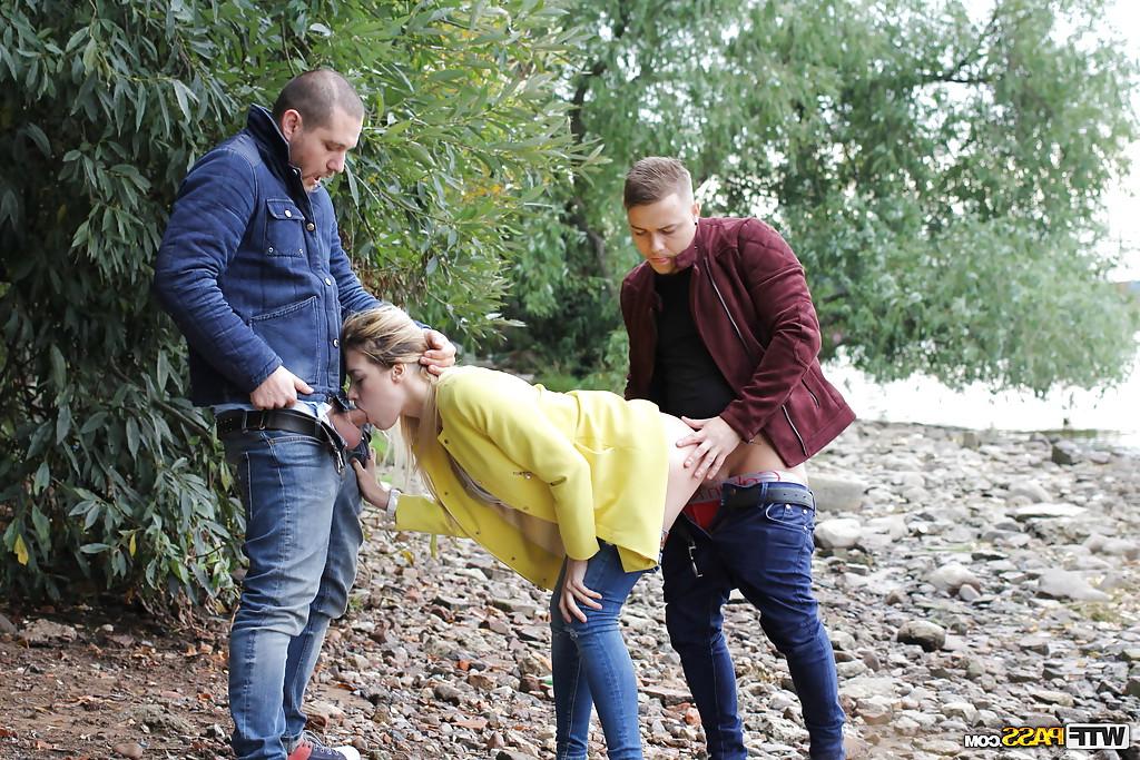 16P Blonde Euro chick Olivia getting spit roasted outdoors in MMF threesome