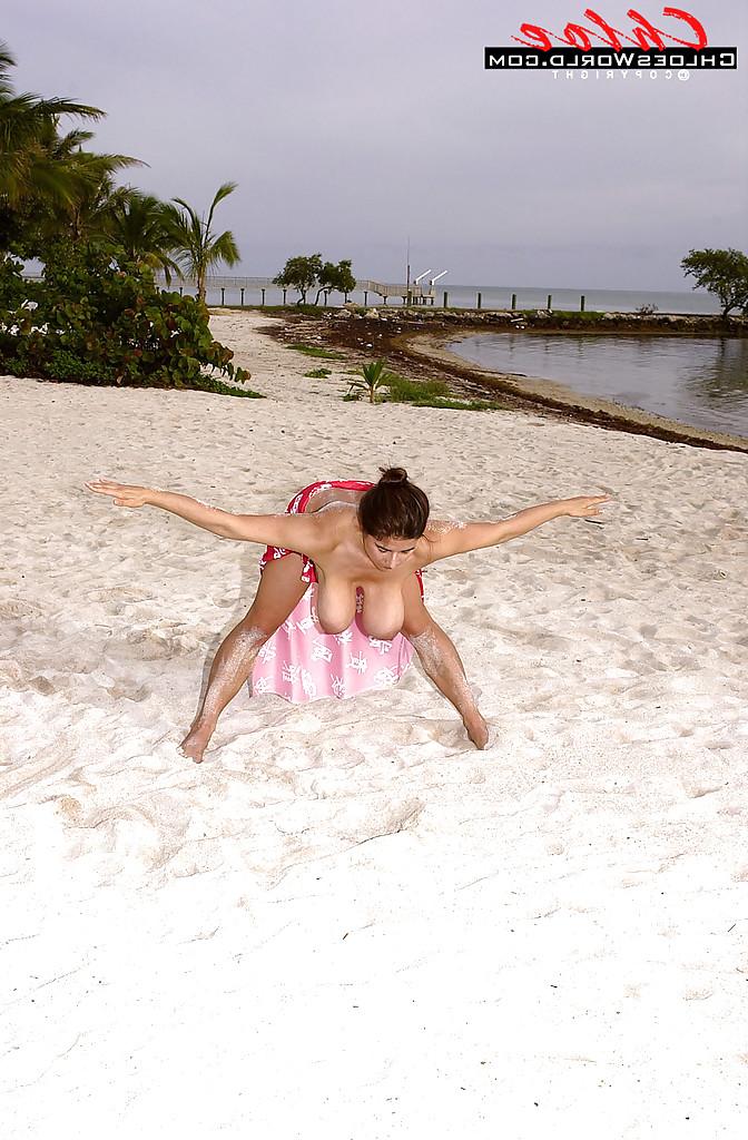 16P Top heavy MILF Chloe Vevrier exposing hairy pussy outdoors on beach
