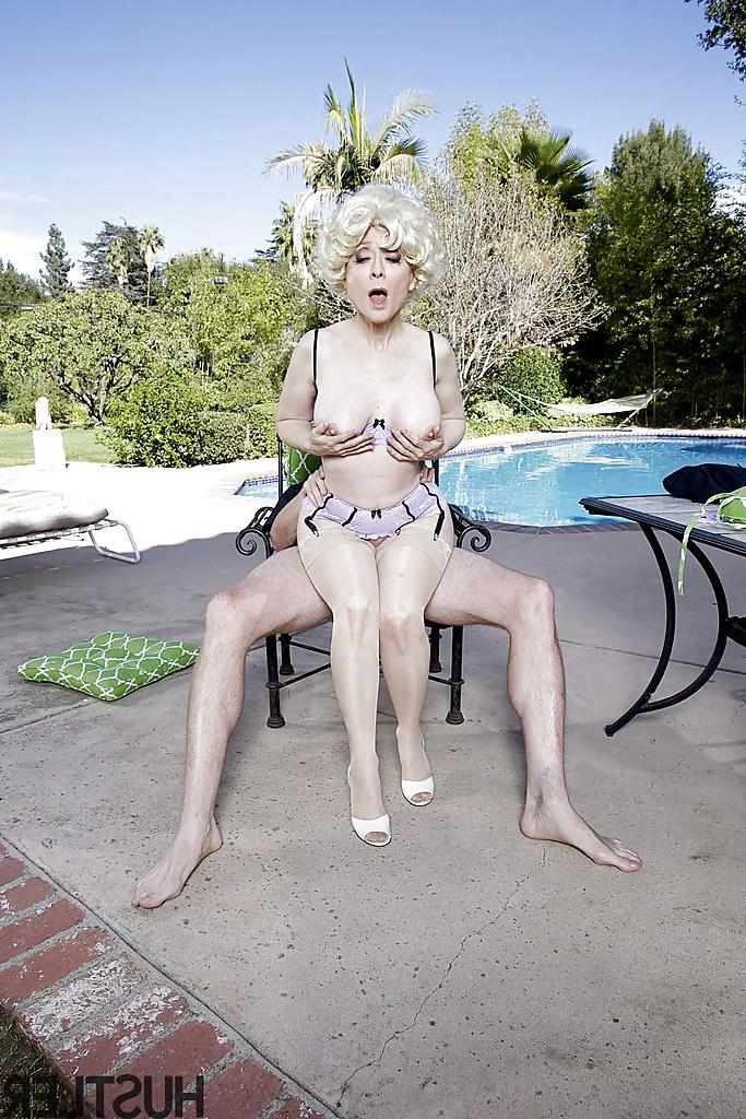 16P Bosomy aged pornstar Nina Hartley having her granny pussy licked outdoors