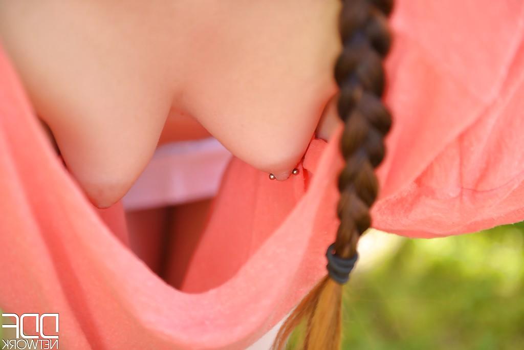 16P Cute Euro chick Amber Nevada bares nice pierced nipples outdoors