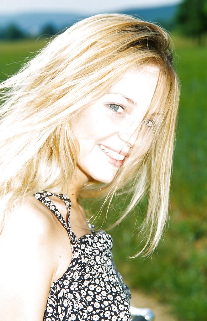 16P Close up outdoor posing featuring teen babe Zuzana G on a bike