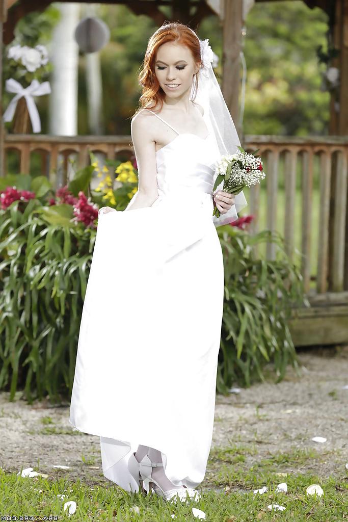 16P Redhead teen babe Dolly Little stripping off wedding dress outdoors