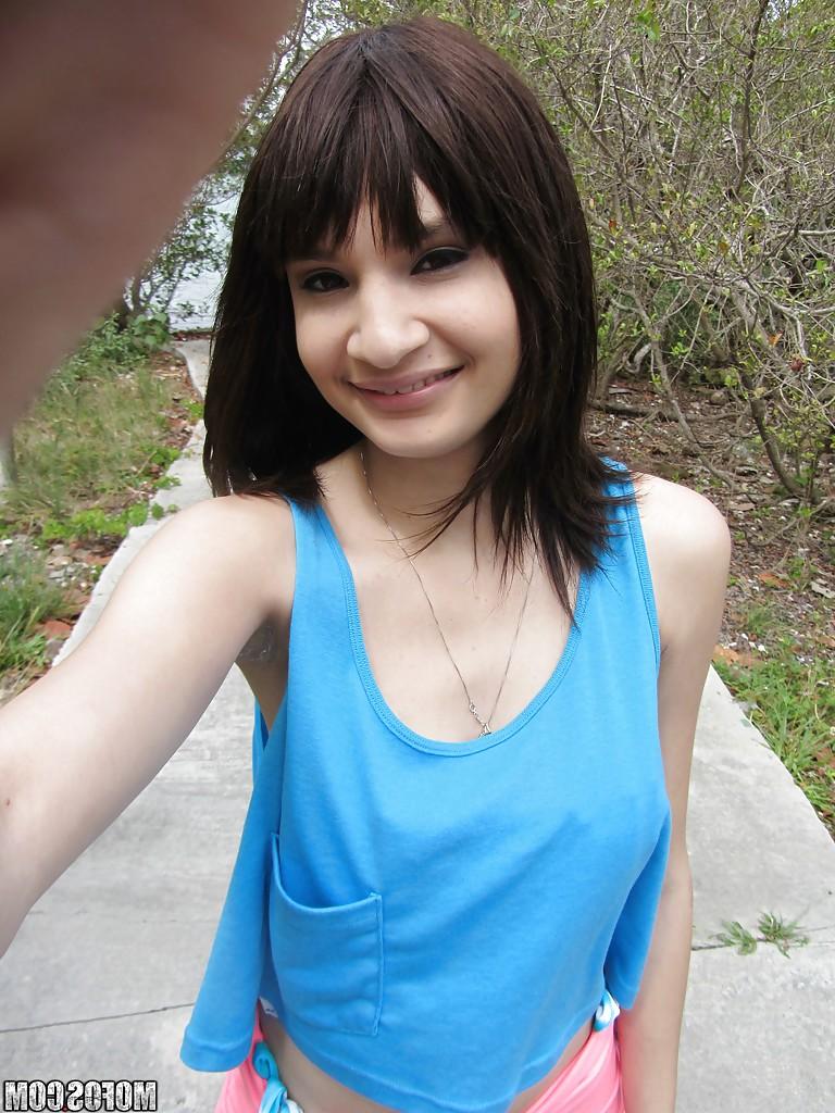 14P Latina babe Jessi Grey dose self shots of her tiny tits outdoor