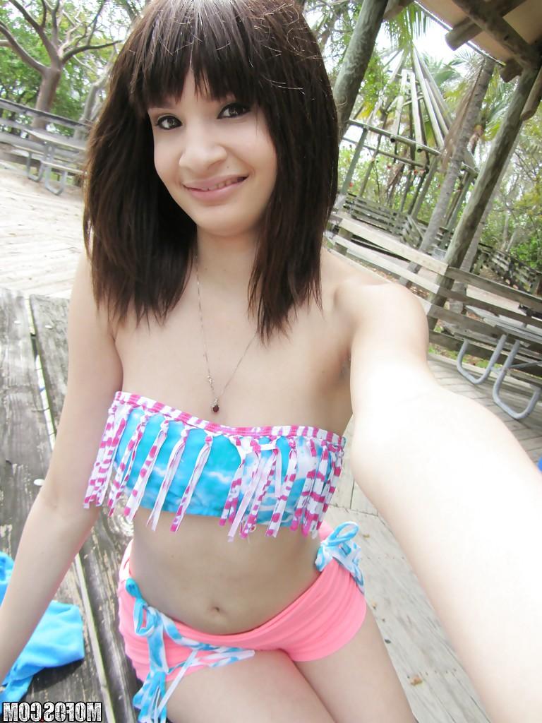 14P Latina babe Jessi Grey dose self shots of her tiny tits outdoor
