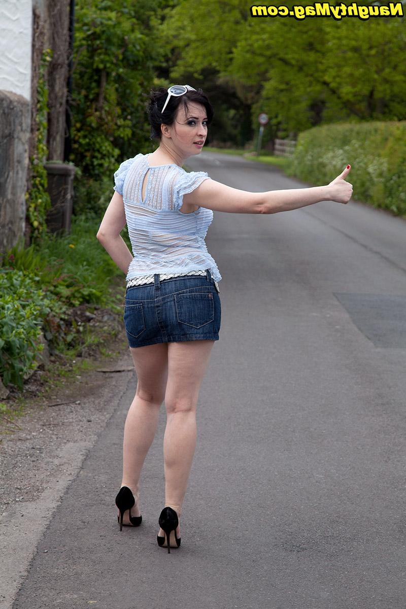 16P Dark haired amateur Jena flashes panty upskirt spreading legs outdoors