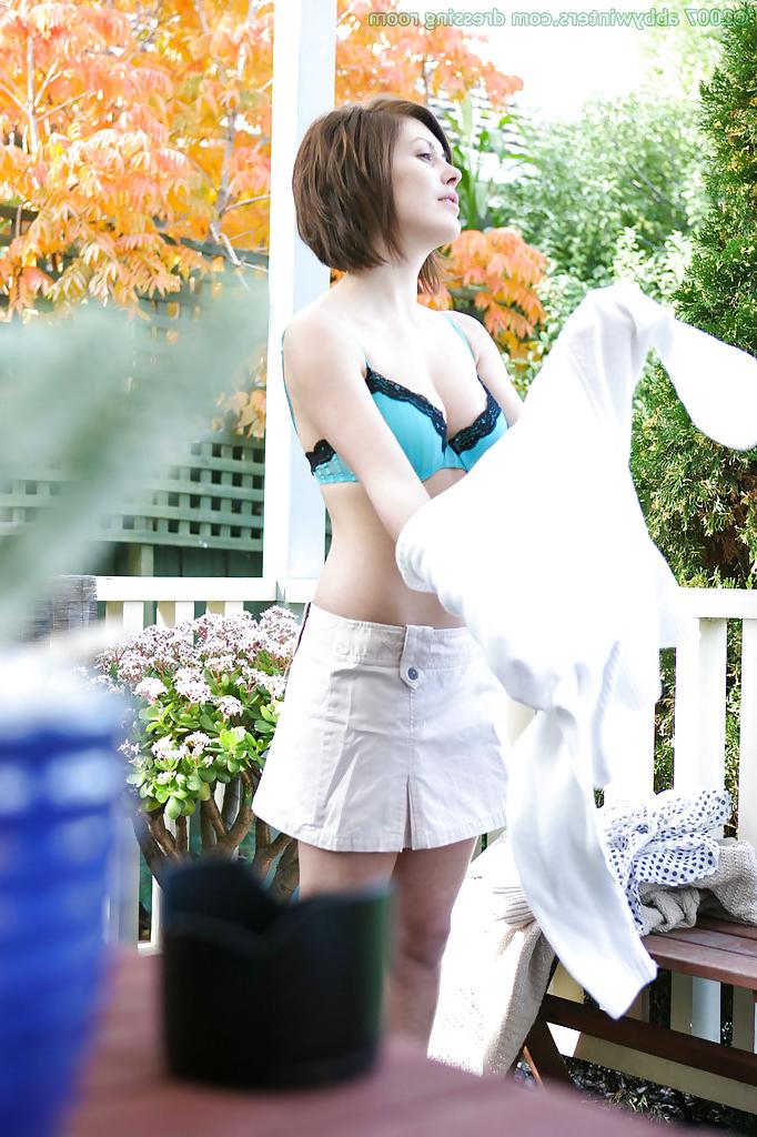 16P Amateur babe Brandy removing her bra and panties outdoors as seen by voyeur