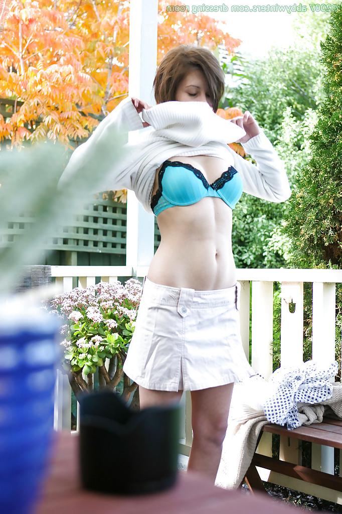 16P Amateur babe Brandy removing her bra and panties outdoors as seen by voyeur