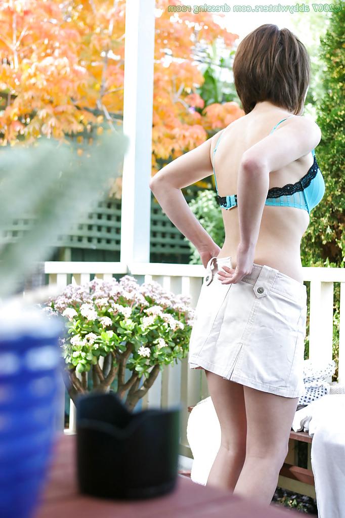 16P Amateur babe Brandy removing her bra and panties outdoors as seen by voyeur
