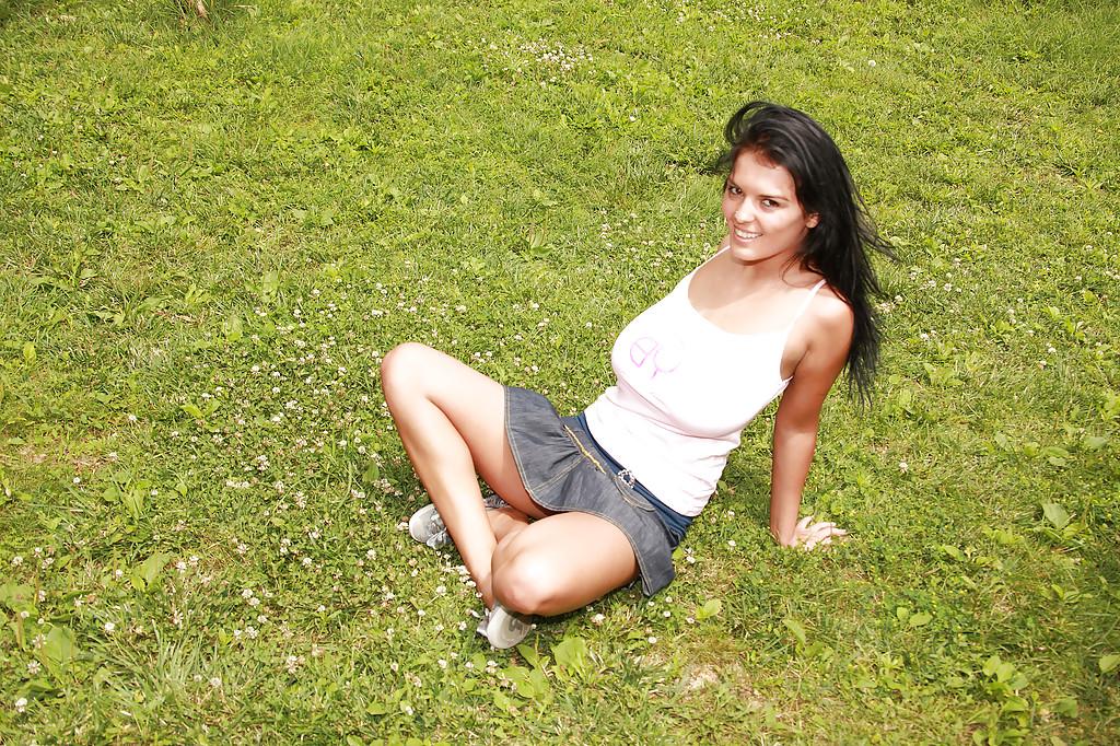 16P Seductive brunette babe with amazing tits toying her shaved cunt outdoor