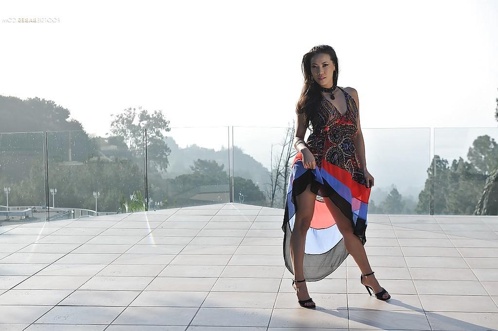 16P Asian Milf babe Kalina Ryu posing outdoors fully clothed in high heels