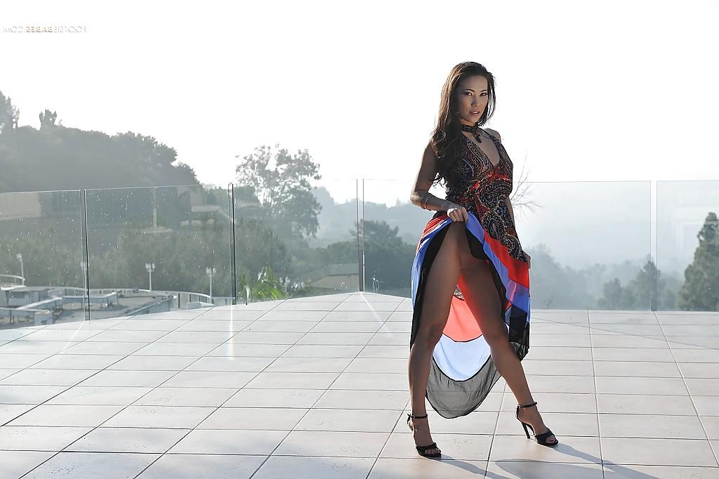 16P Asian Milf babe Kalina Ryu posing outdoors fully clothed in high heels