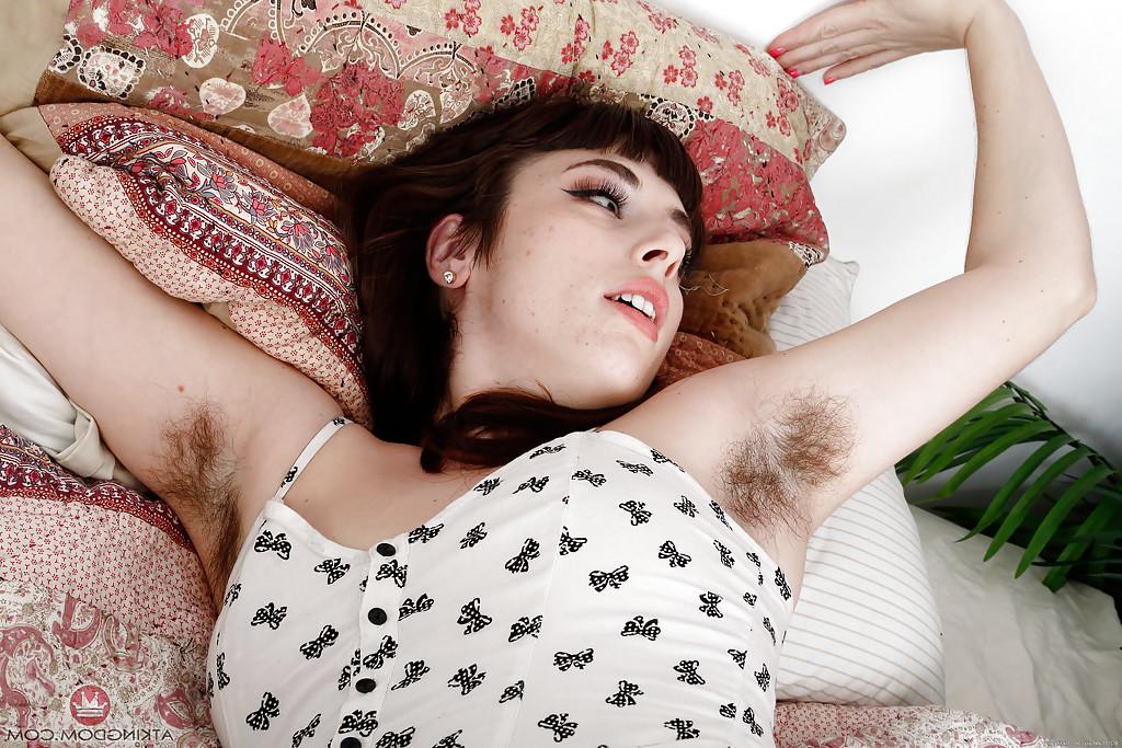 16P Aged brunette female Simone Delilah showing off hairy pits and legs