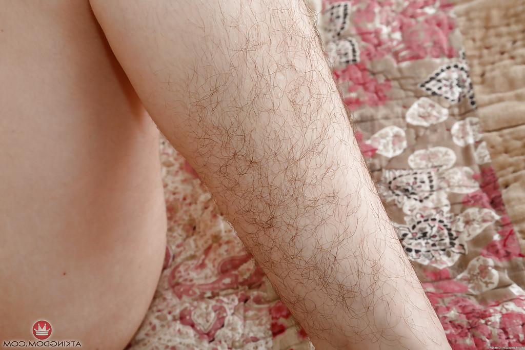 16P Aged brunette female Simone Delilah showing off hairy pits and legs