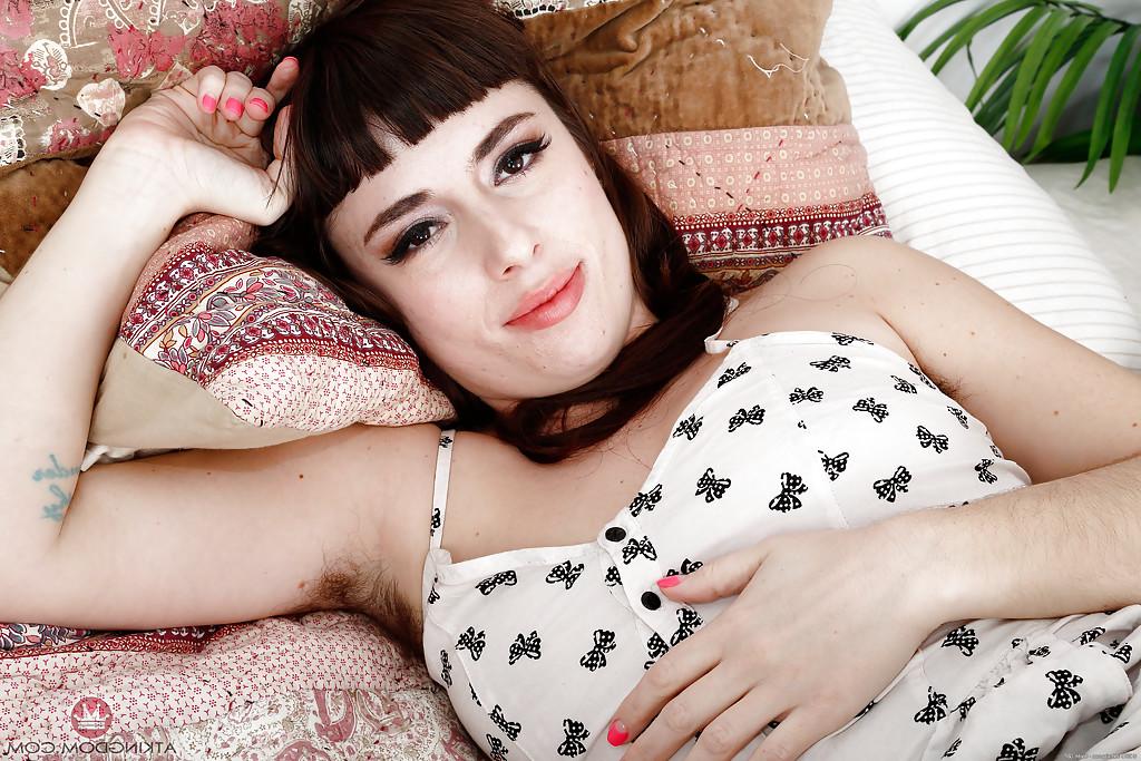 16P Aged brunette female Simone Delilah showing off hairy pits and legs