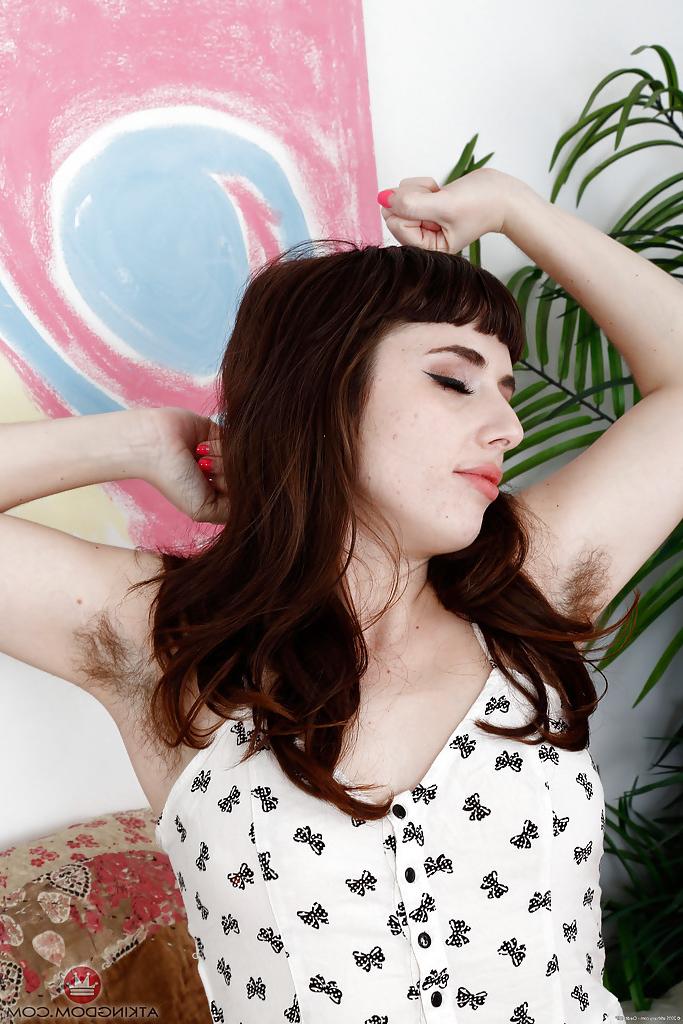 16P Aged brunette female Simone Delilah showing off hairy pits and legs