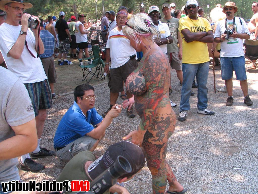 12P Random naked people at an outdoor public nudity party
