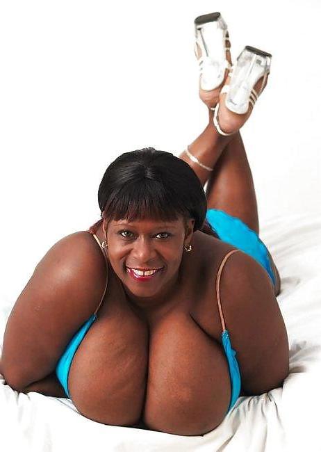 12P Large ebony tits photos