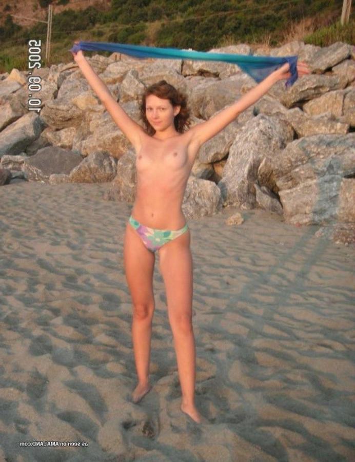 12P Amateur pretty chick showing her hot tits outdoors