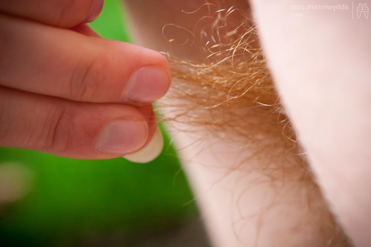 15P Curvy and natural redhead showing her unshaved hairy pussy outdoors