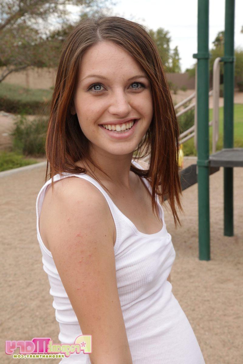 16P Beautiful pregnant redhead teen teasing herself outdoors