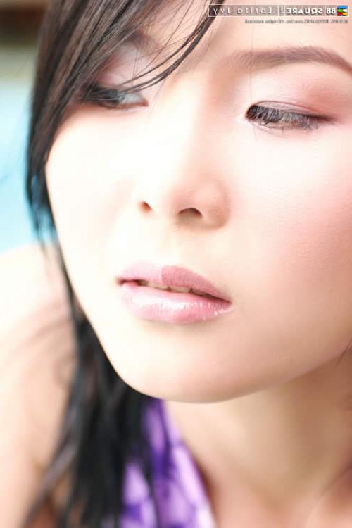 15P Adorable asian girl in a bikini
