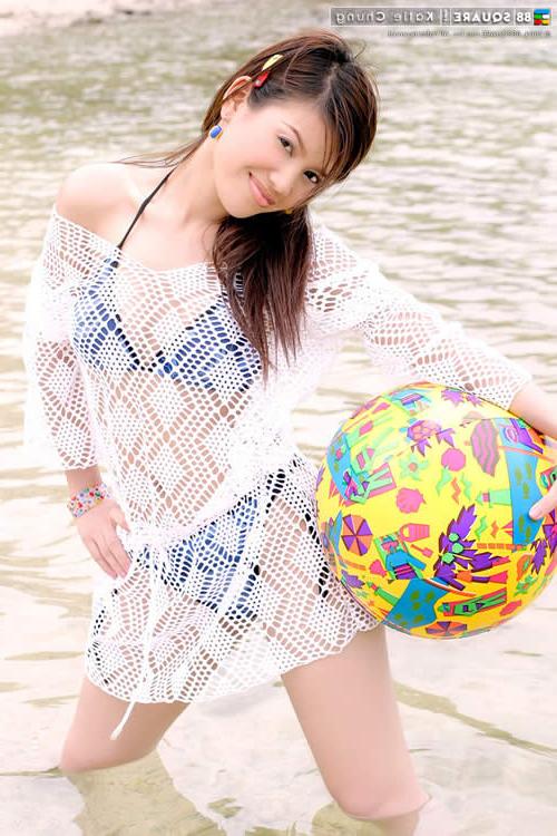 15P Adorable asian girl in a bikini