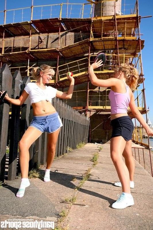15P Two sports girls do outdoor pantyhose drills