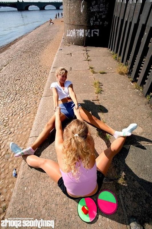 15P Two sports girls do outdoor pantyhose drills